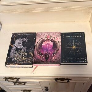 Fantasy and Romance books the hermit the darkness within us the stars are dying